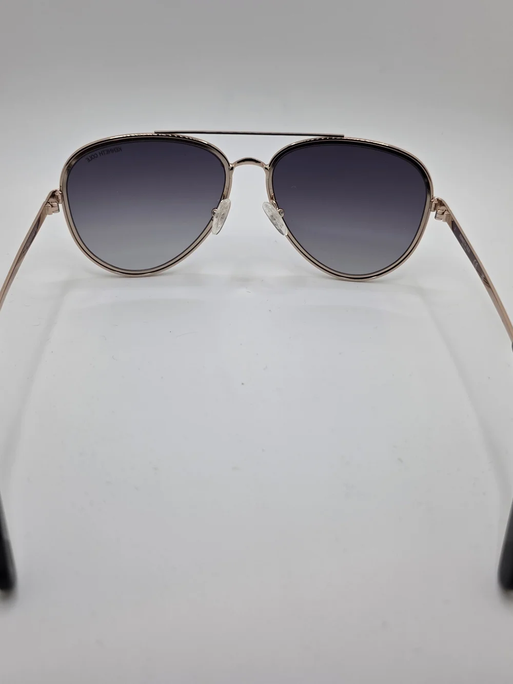 Kenneth Cole Rose Gold Aviator Sunglasses with Dark Gradient Lenses